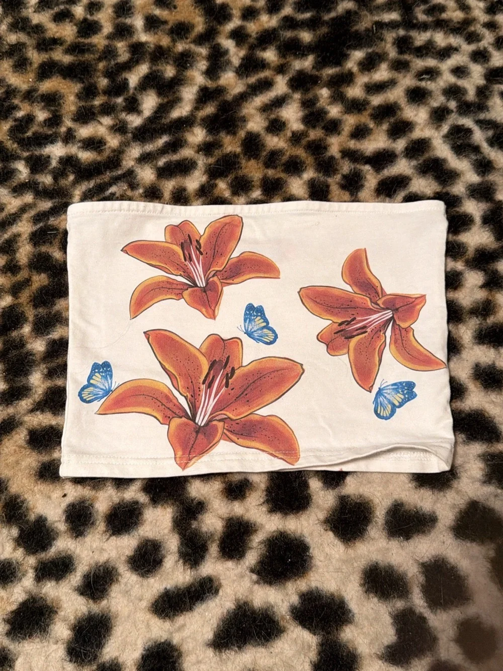 Edikted Cream Tube Crop Top with Orange Lily & Blue Butterfly Print